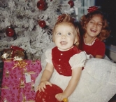 Here is a picture of my sister and I Christmas morning 51 years ago.    We are 9 years apart in age but as close as two sisters can be. - Terri A