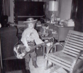 It was 1965 and we were very poor. I received a used guitar with a rope for a strap and a new red cowboy hat...my mom captioned the picture "Beatle" Primel - Robin